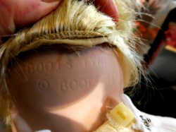 porcelain baby doll white gown marks